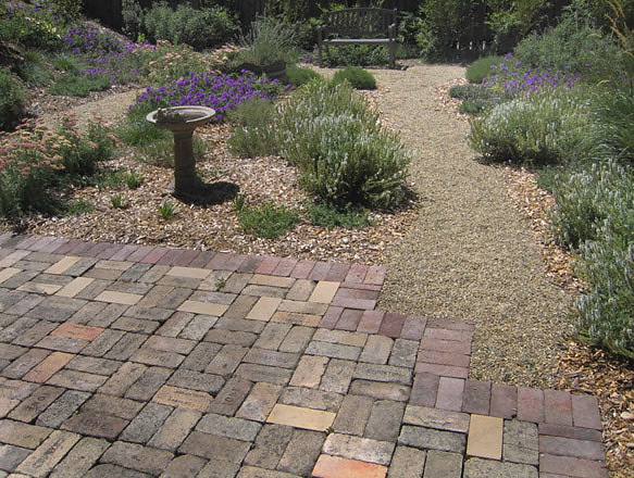 Recycled brick patio and gravel path. Photo © Michael Thilgen